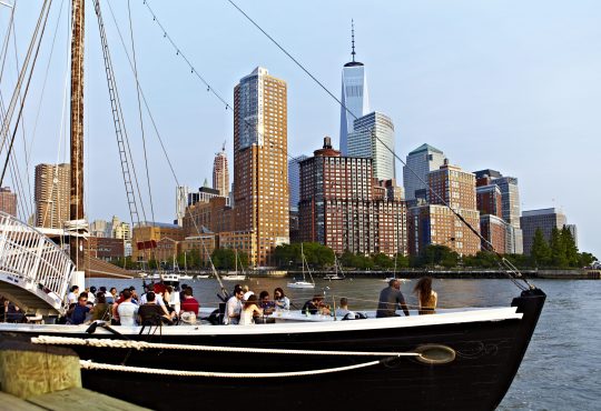 Neighborhood gallery - 5 of 9 - NYC skyline above river & sailboat