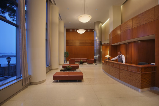 Amenities gallery - 3 of 5 - Tribeca point lobby with wooden finishes